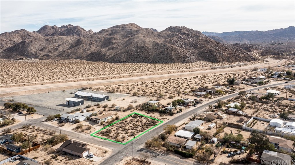 62113 Desert Air Road Joshua Tree, CA 92252 - Photo 1 of 1 an aerial view of mountain with trees