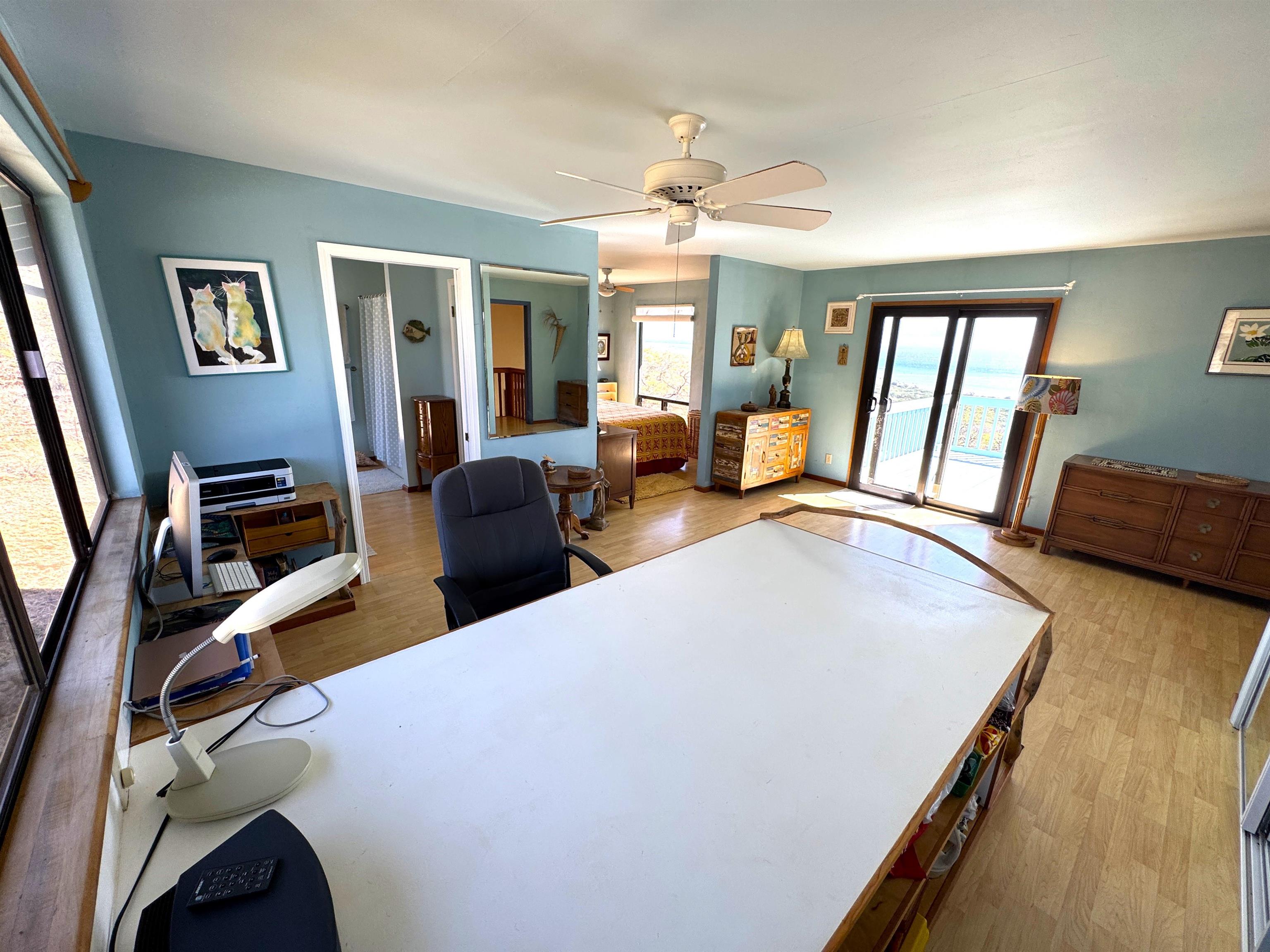 380 Ulua Road, Unit LOT 171 Kaunakakai, HI 96748 - Photo 23 of 44 a living room with furniture and a flat screen tv