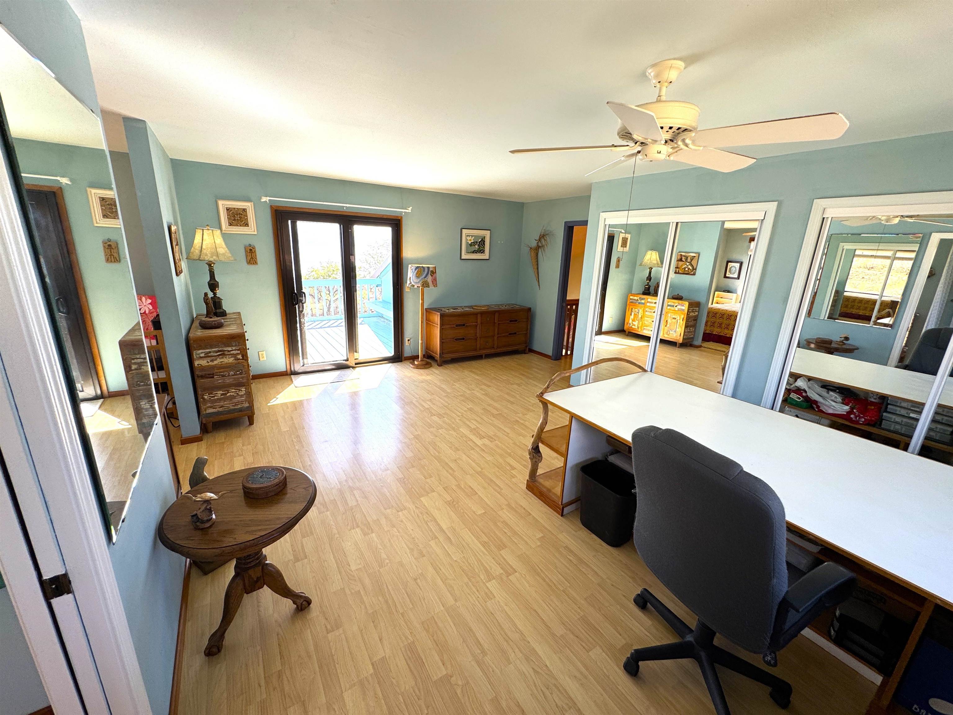 380 Ulua Road, Unit LOT 171 Kaunakakai, HI 96748 - Photo 27 of 44 a room with furniture and a chandelier