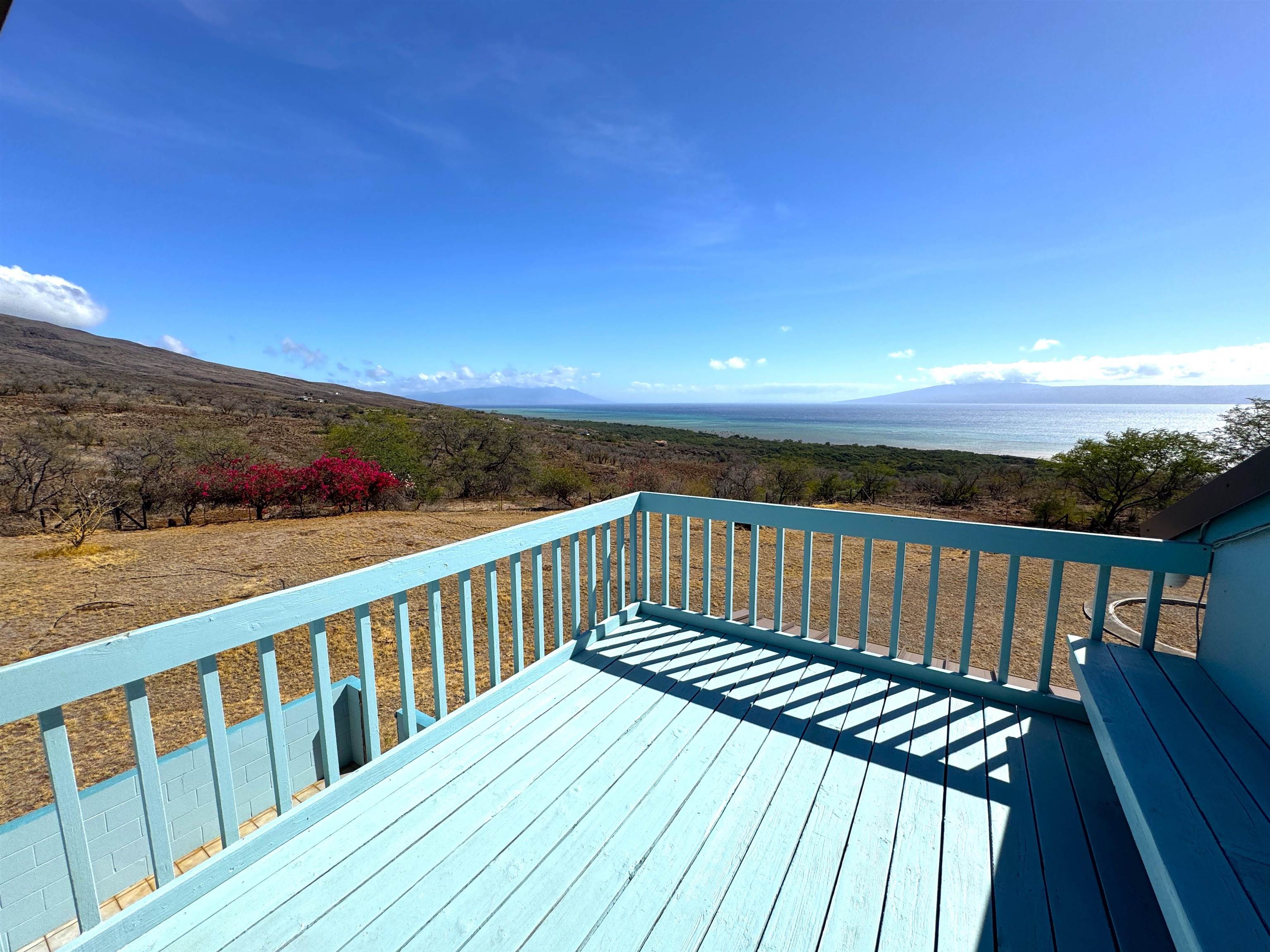 380 Ulua Road, Unit LOT 171 Kaunakakai, HI 96748 - Photo 28 of 44 a view of balcony with wooden floor and city view