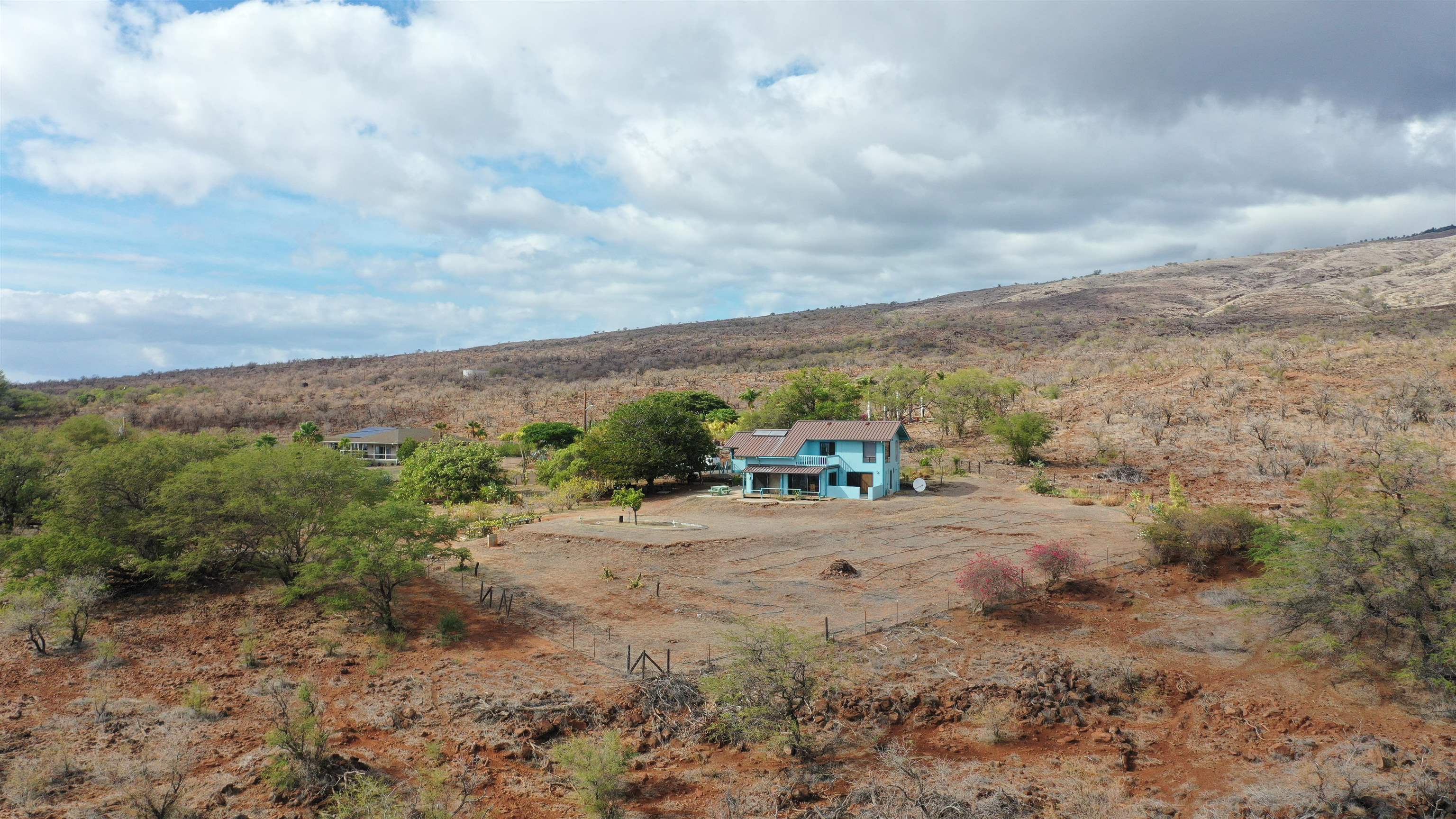 380 Ulua Road, Unit LOT 171 Kaunakakai, HI 96748 - Photo 40 of 44 a view of a dry yard with lots of trees
