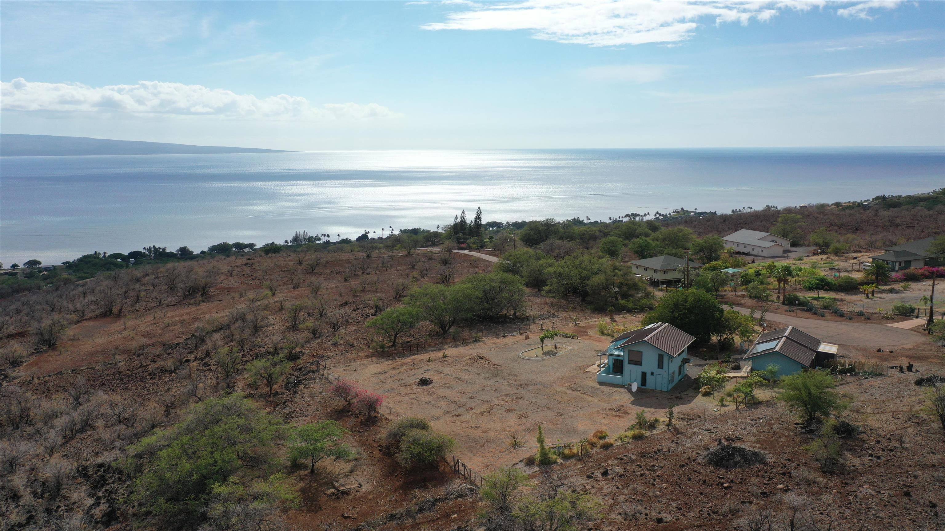 380 Ulua Road, Unit LOT 171 Kaunakakai, HI 96748 - Photo 42 of 44 a view of a lake with mountain in front of it