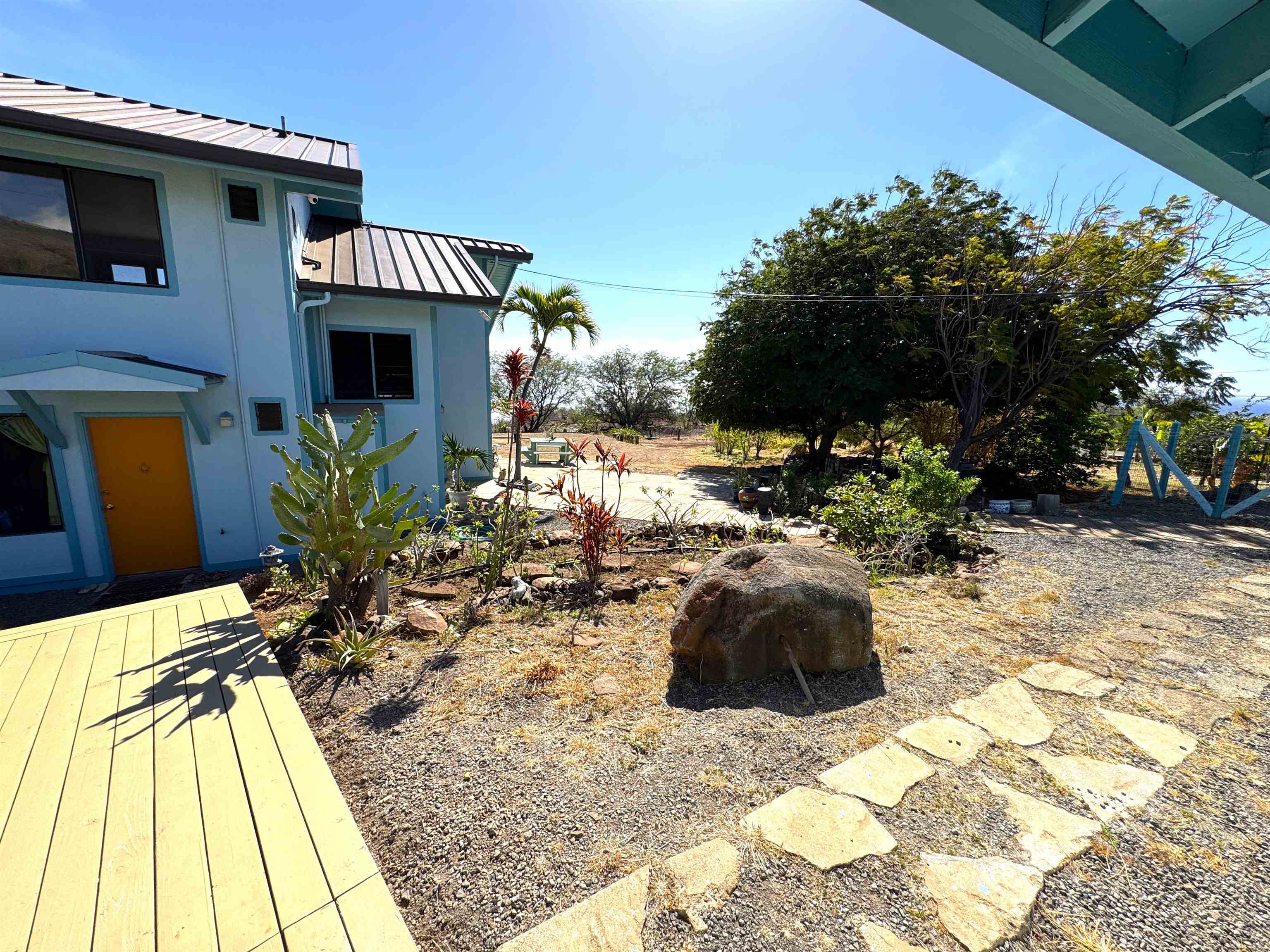 380 Ulua Road, Unit LOT 171 Kaunakakai, HI 96748 - Photo 6 of 44 a view of a backyard of the house