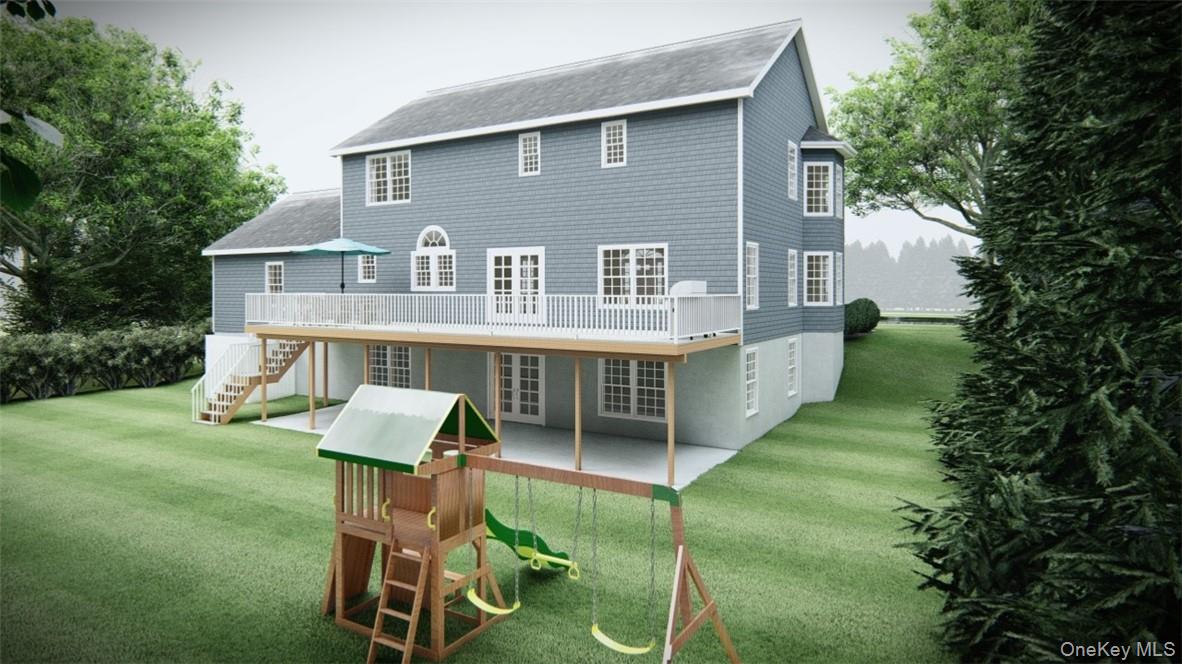 9 Chestnut Street Ardsley, NY 10502 - Photo 4 of 7 a front view of a house with a yard table and chairs