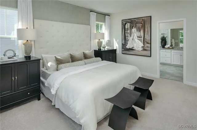 a bedroom with a bed and glass windows