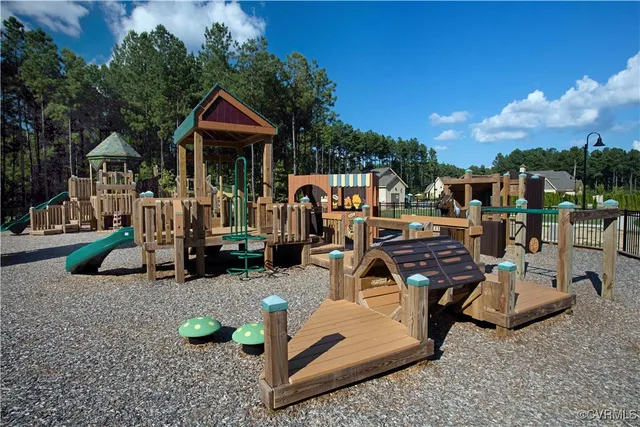 a view of a backyard with sitting area
