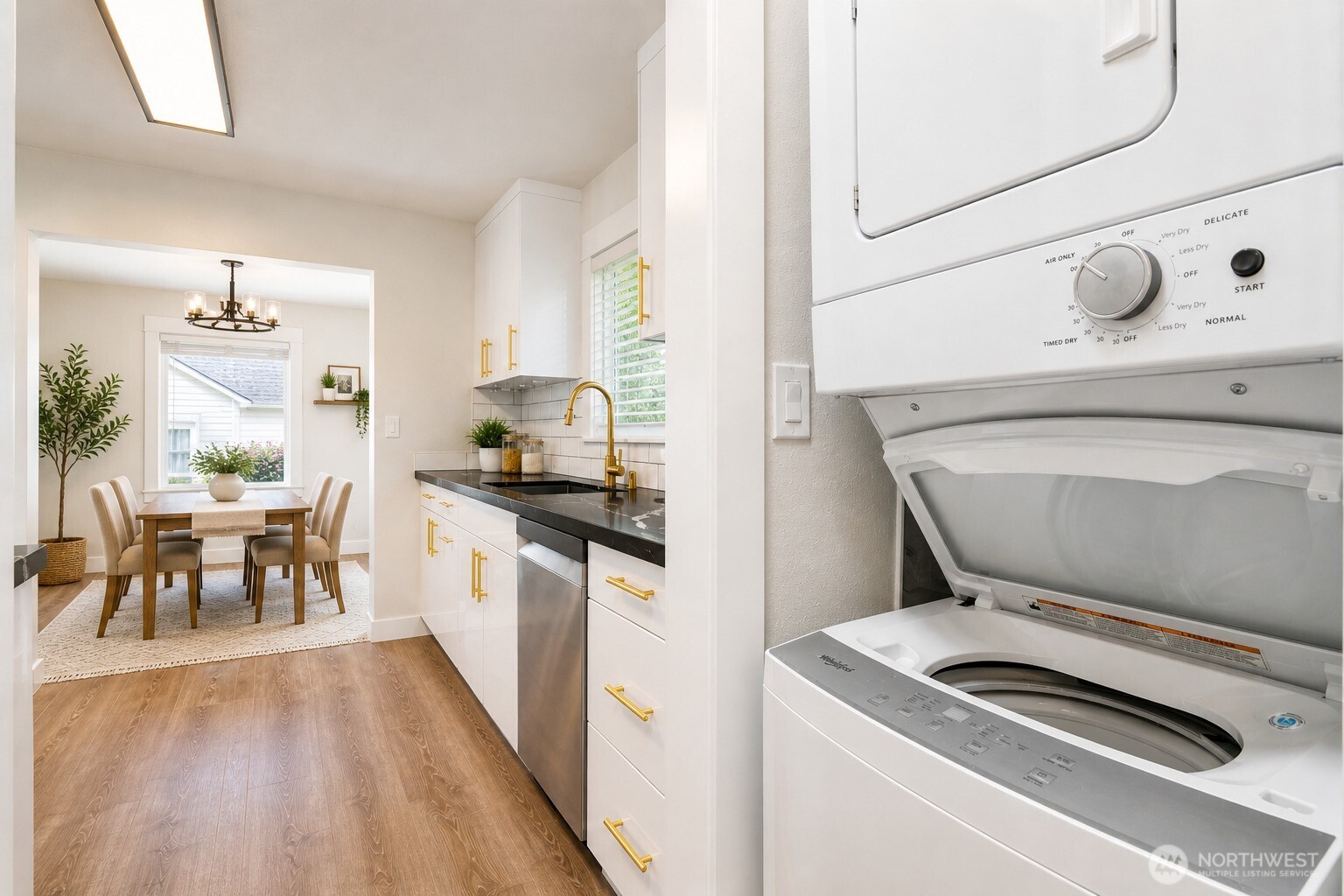 6919 Cady Road Everett, WA 98203 - Photo 12 of 19 a kitchen with a stove and white cabinets