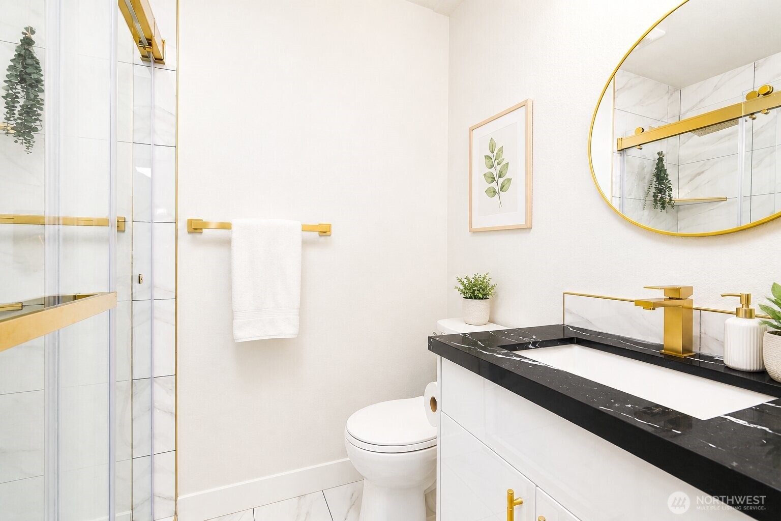 6919 Cady Road Everett, WA 98203 - Photo 13 of 19 a bathroom with a granite countertop sink and a mirror