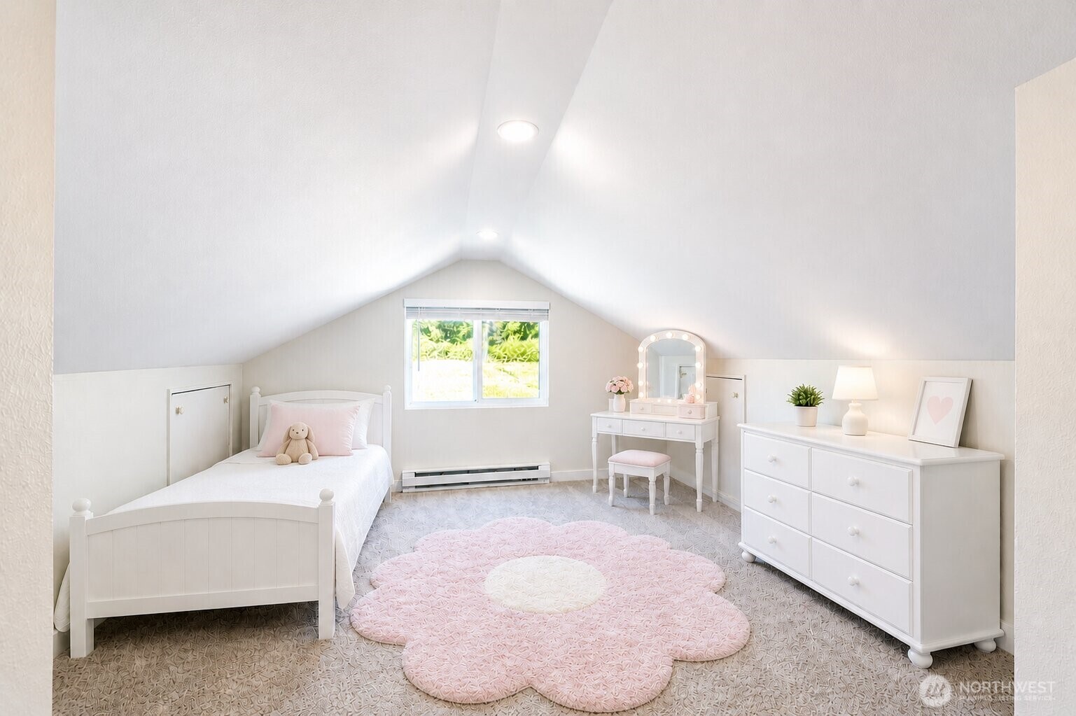 6919 Cady Road Everett, WA 98203 - Photo 14 of 19 a spacious bedroom with a bed and a table in it