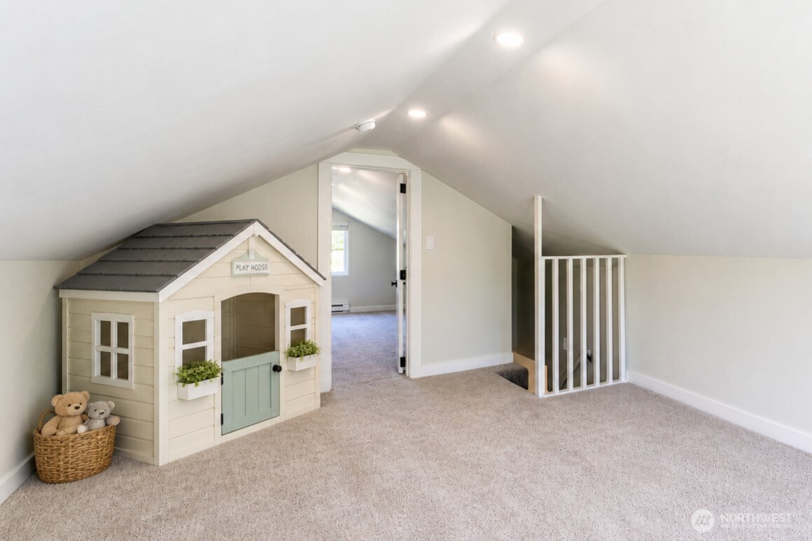 6919 Cady Road Everett, WA 98203 - Photo 16 of 19 a view of livingroom with stairs and furniture