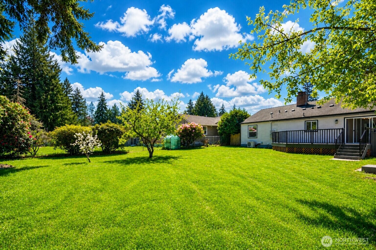 6919 Cady Road Everett, WA 98203 - Photo 18 of 19 a front view of house with yard and trees