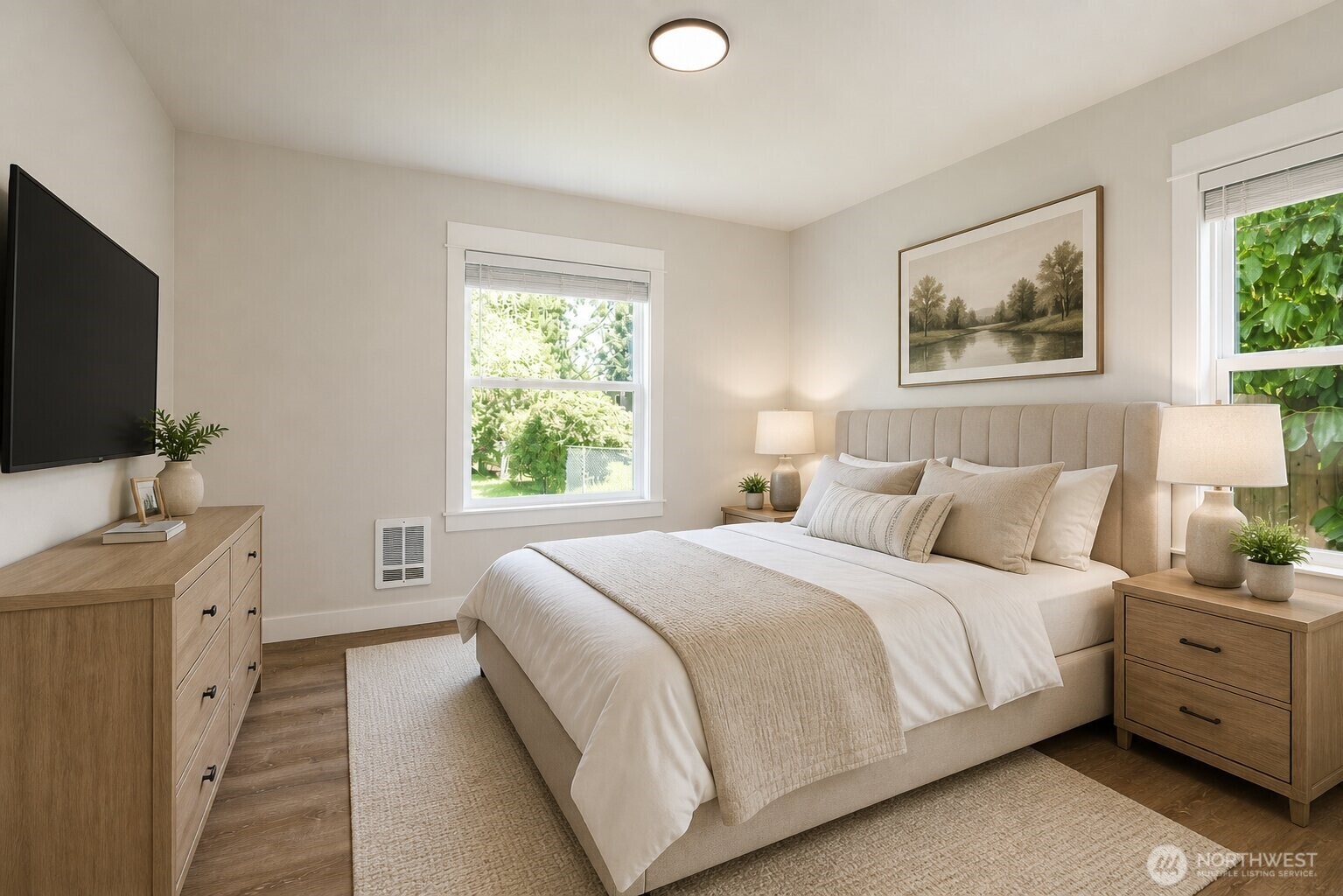 6919 Cady Road Everett, WA 98203 - Photo 4 of 19 a bedroom with a large bed and a flat screen tv