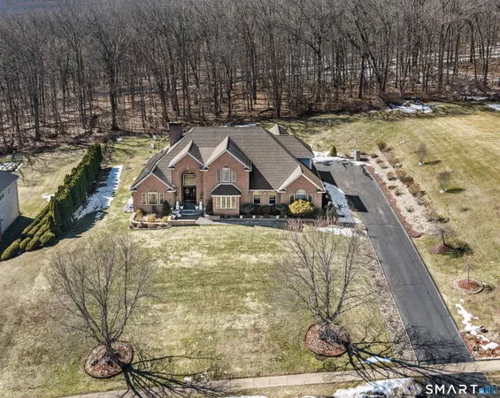 a house with trees in the background