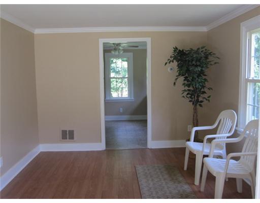1710 Brodhead Road Coraopolis, PA 15108 - Photo 14 of 18 Living Room. The Living Room in the small house offers lots of light with it s sliding glass door to the covered front patio. New laminant flooring and paint throughout!