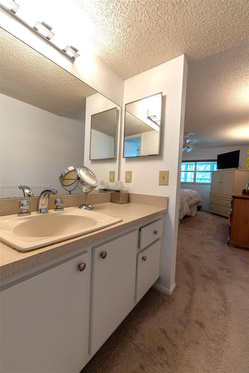 8814 West McNab Road, Unit 204 Tamarac, FL 33321 - Photo 17 of 23 Master Bathroom