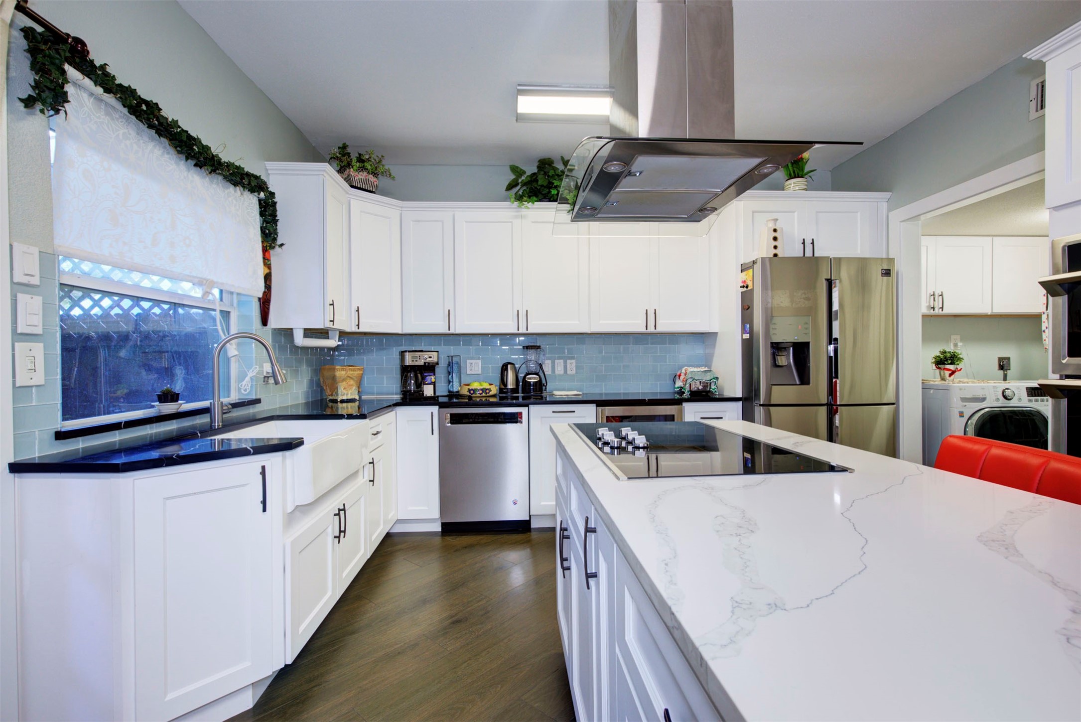 840 Threadneedle Street, Unit 208 Houston, TX 77079 - Photo 3 of 31 a kitchen with stainless steel appliances granite countertop a sink refrigerator and cabinets