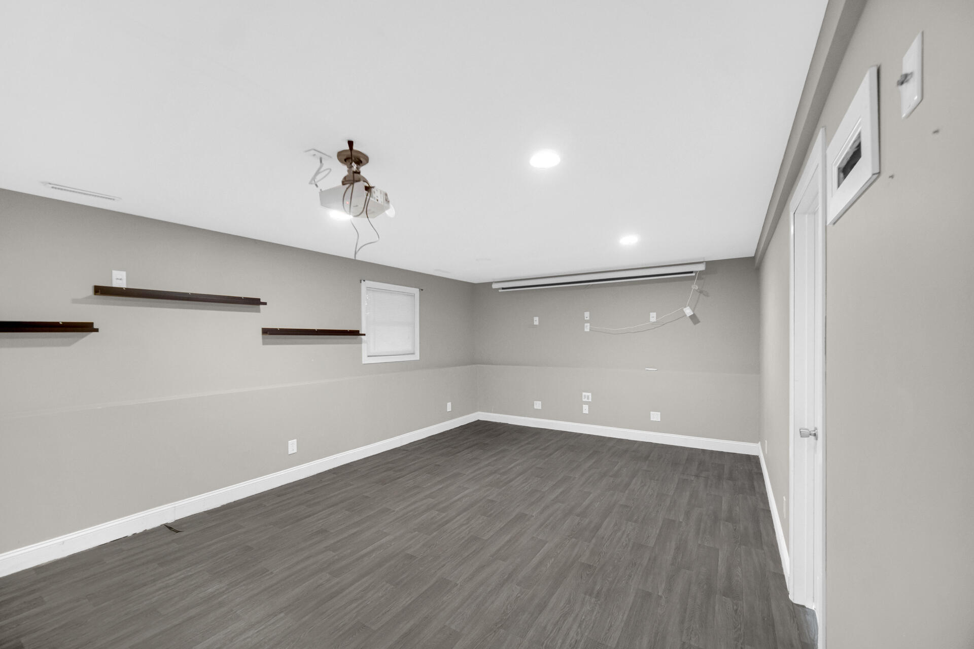 3716 Walsh Street Portage, IN 46368 - Photo 15 of 24 wooden floor in an empty room with a window