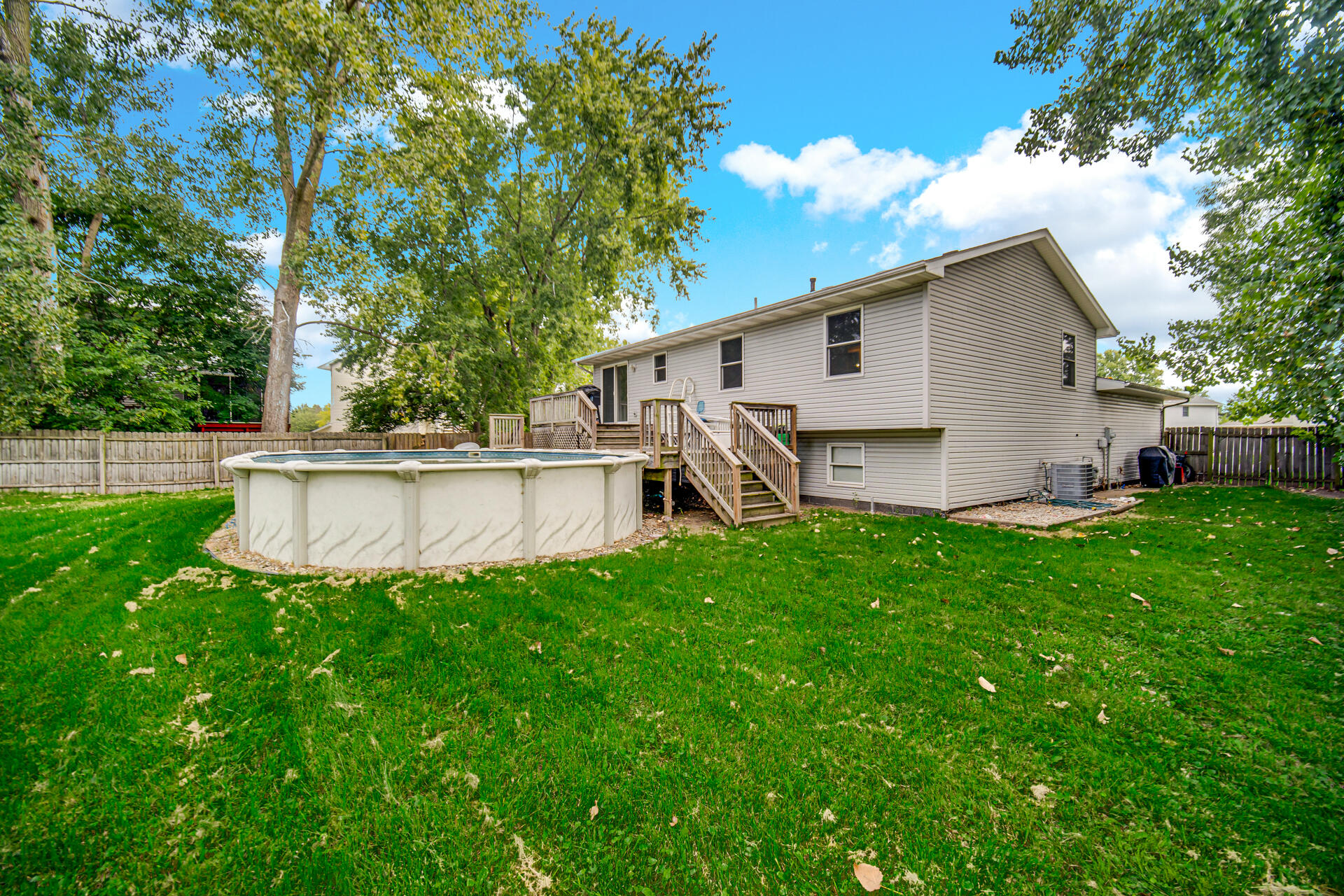 3716 Walsh Street Portage, IN 46368 - Photo 22 of 24 a view of a house with a yard and a garden