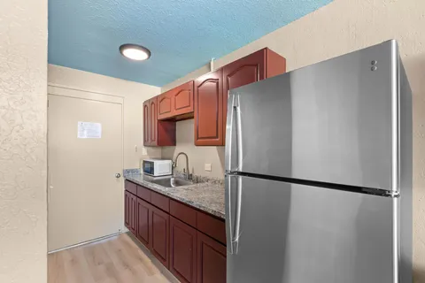 a bathroom with a sink and mirror