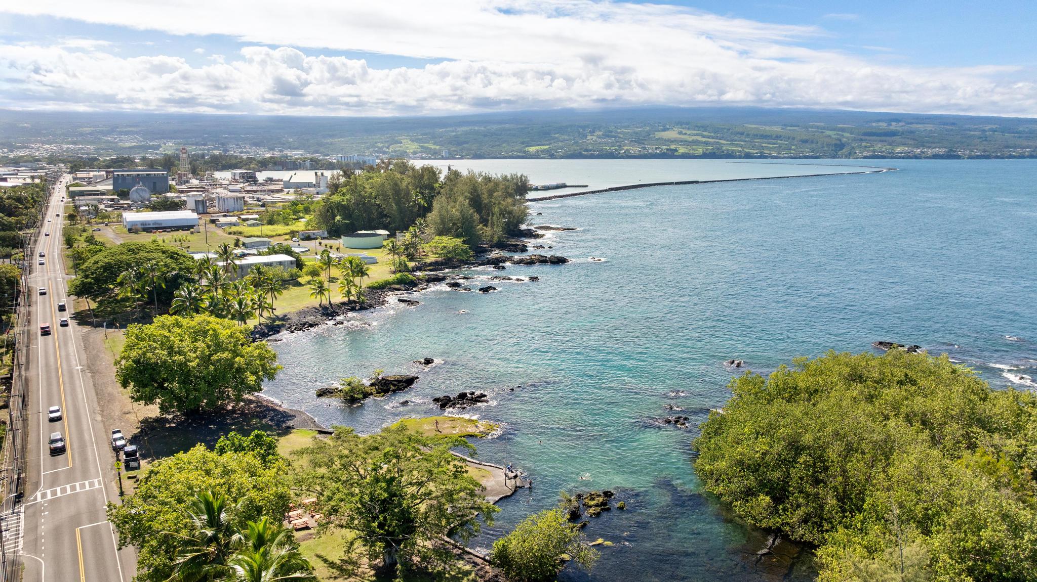 1303 Kalanianaole Street, Unit 112 Hilo, HI 96720 - Photo 8 of 27 a view of a lake with a city