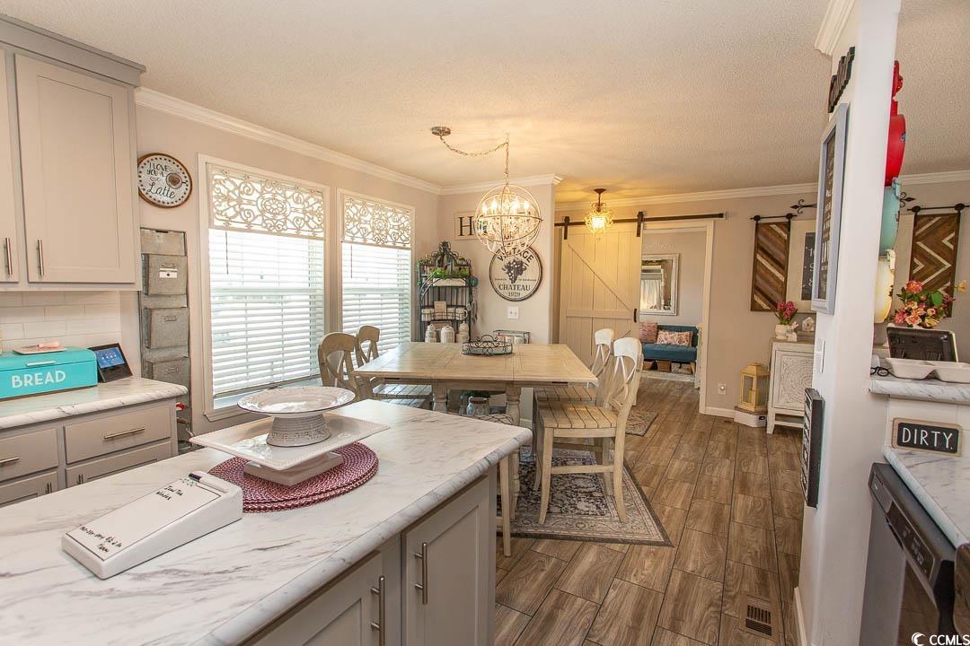 1664 Greenridge Drive Conway, SC 29526 - Photo 11 of 40 Kitchen featuring crown molding, gray cabinets, a