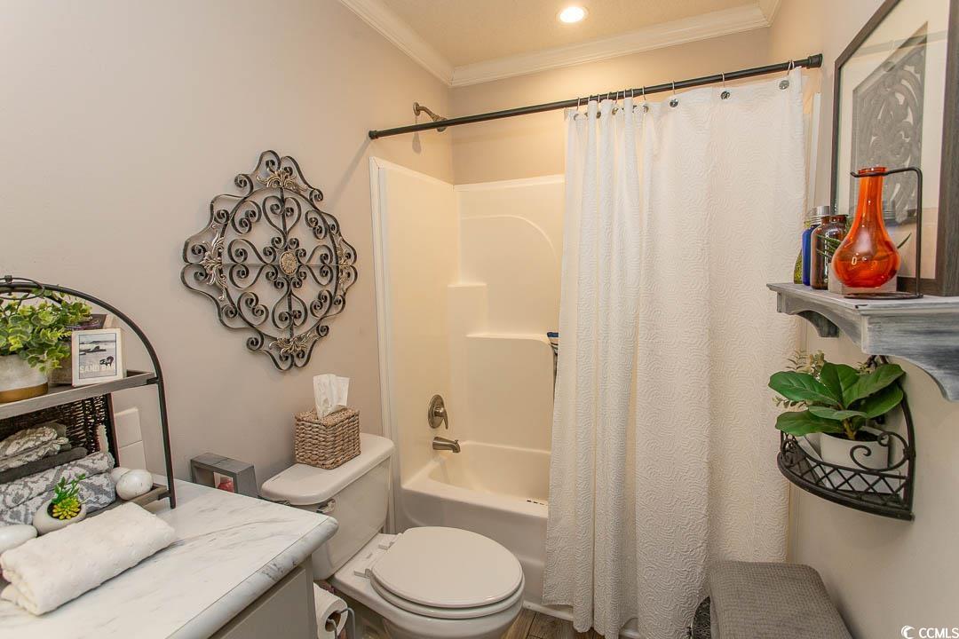 1664 Greenridge Drive Conway, SC 29526 - Photo 21 of 40 Bathroom featuring shower / tub combo, toilet, and