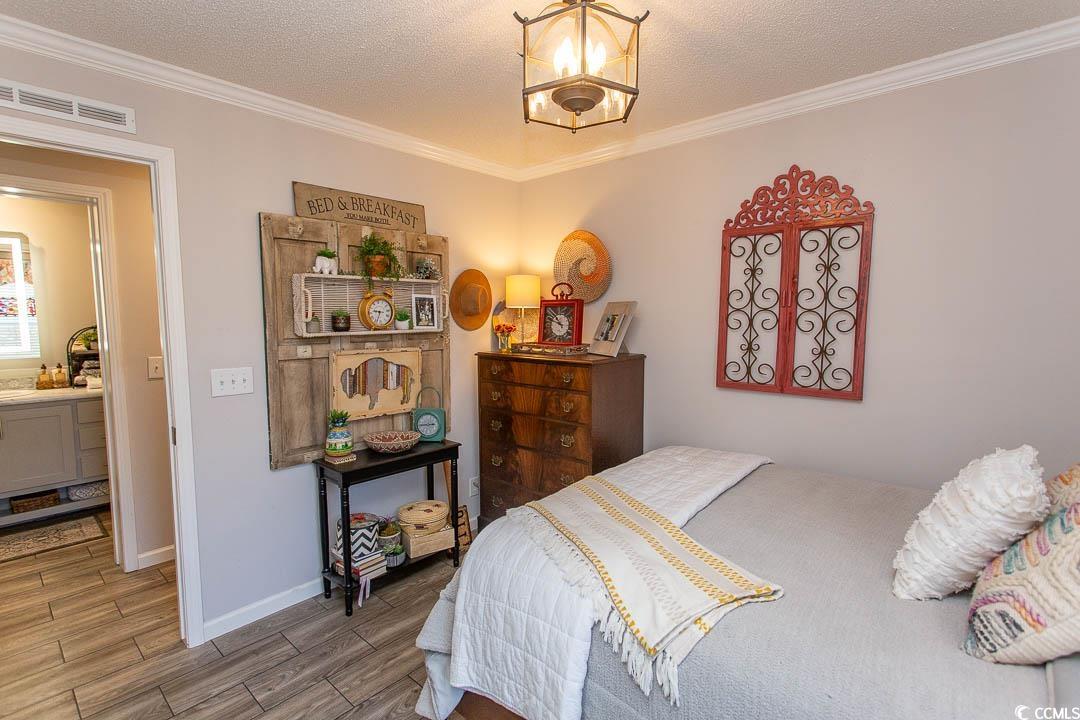 1664 Greenridge Drive Conway, SC 29526 - Photo 25 of 40 Bedroom featuring visible vents, baseboards, an in