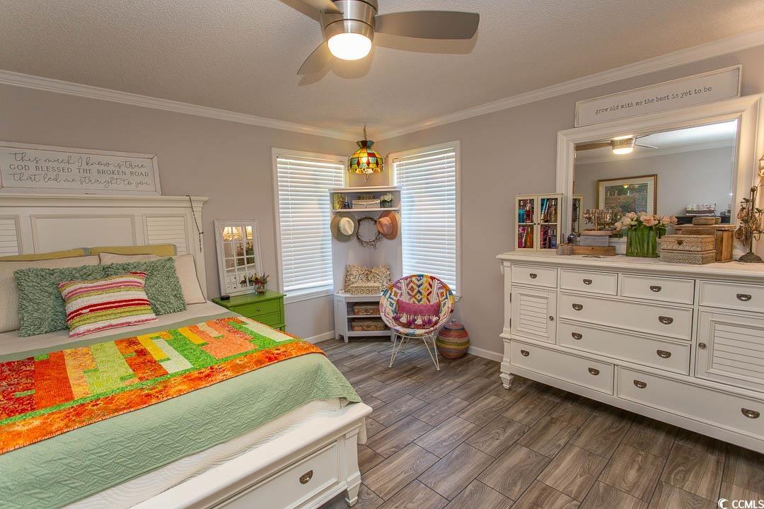 1664 Greenridge Drive Conway, SC 29526 - Photo 27 of 40 Bedroom with dark wood-style floors, baseboards, a