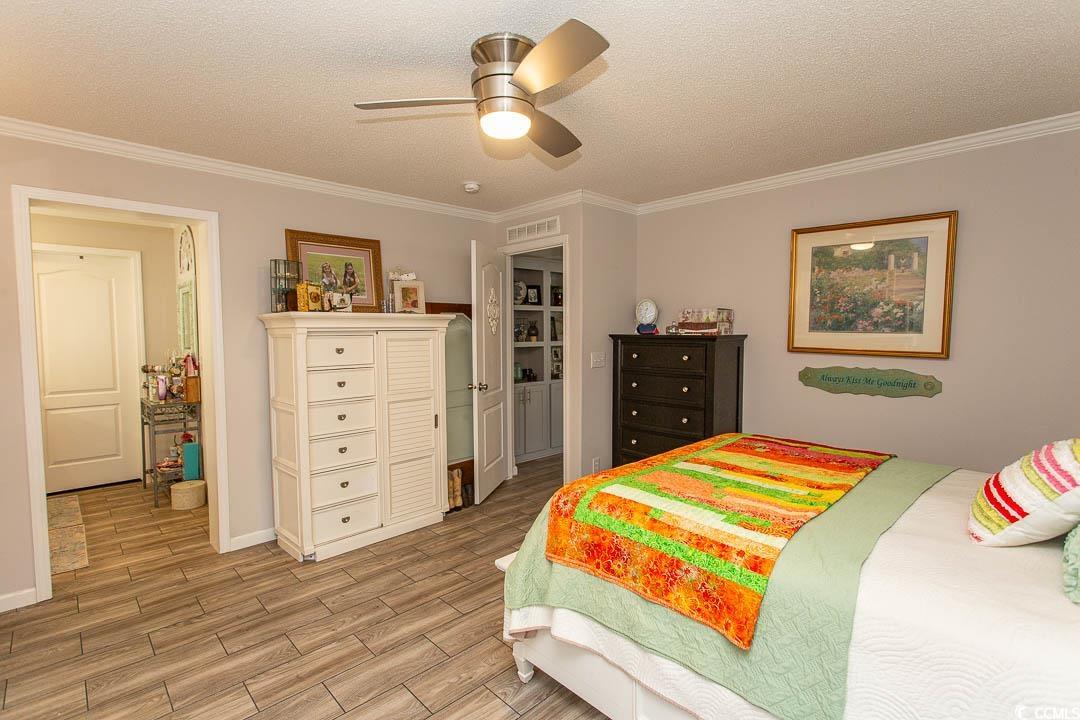 1664 Greenridge Drive Conway, SC 29526 - Photo 28 of 40 Bedroom featuring a textured ceiling, ceiling fan,