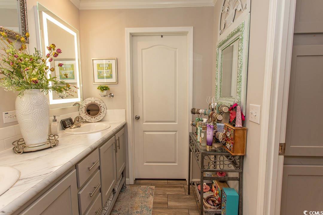 1664 Greenridge Drive Conway, SC 29526 - Photo 30 of 40 Bathroom featuring ornamental molding, double vani