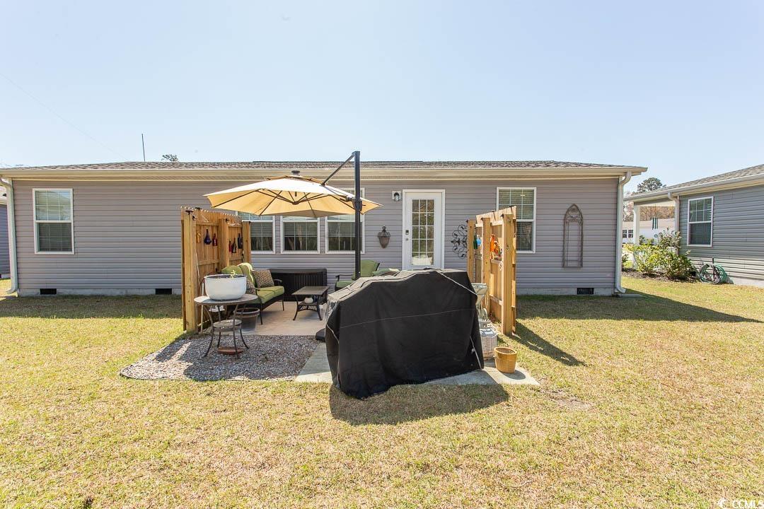 1664 Greenridge Drive Conway, SC 29526 - Photo 38 of 40 Rear view of property featuring a lawn, a patio ar