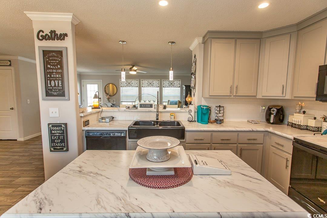 1664 Greenridge Drive Conway, SC 29526 - Photo 8 of 40 Kitchen featuring a sink, gray cabinets, tasteful