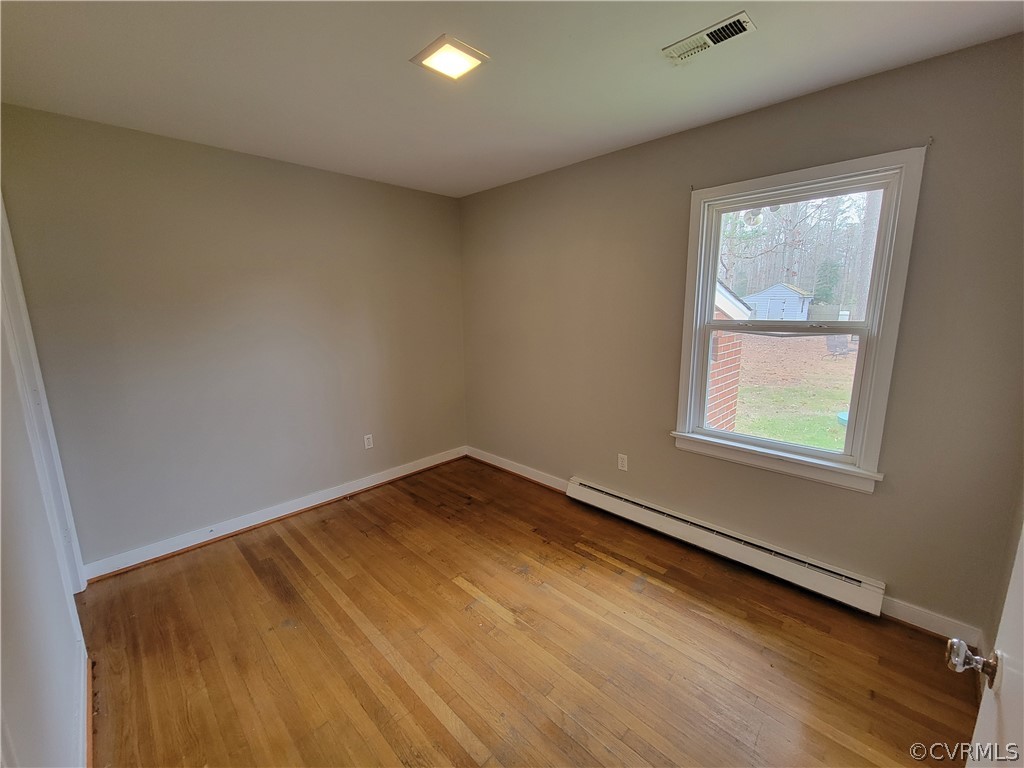 9016 Courthouse Road Chesterfield, VA 23832 - Photo 17 of 20 an empty room with a window