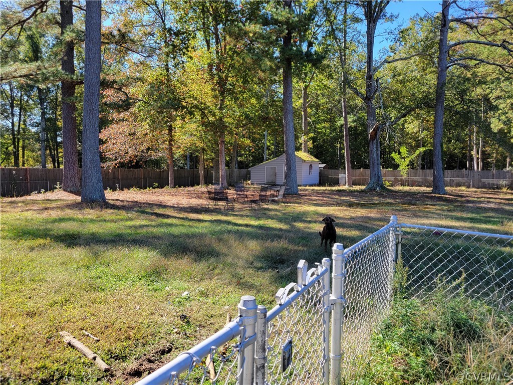 9016 Courthouse Road Chesterfield, VA 23832 - Photo 20 of 20 a view of swimming pool with lawn chairs and plants