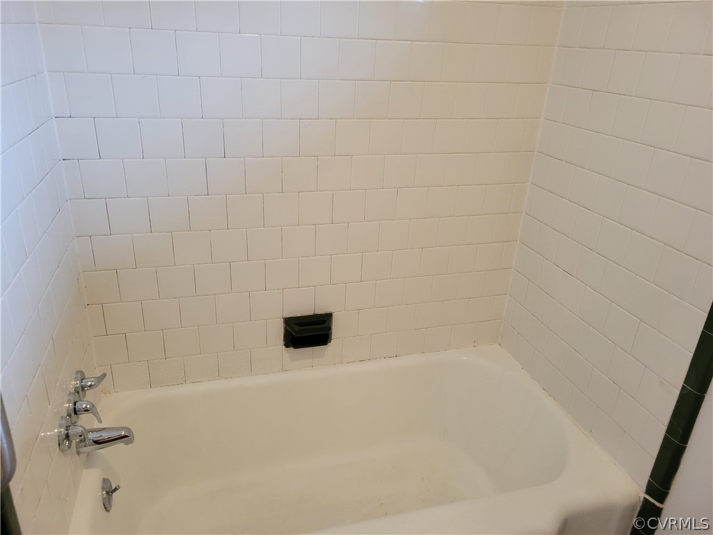 9016 Courthouse Road Chesterfield, VA 23832 - Photo 6 of 20 a bathroom with a bathtub