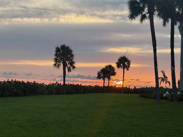 an aerial view of a residential houses with outdoor space