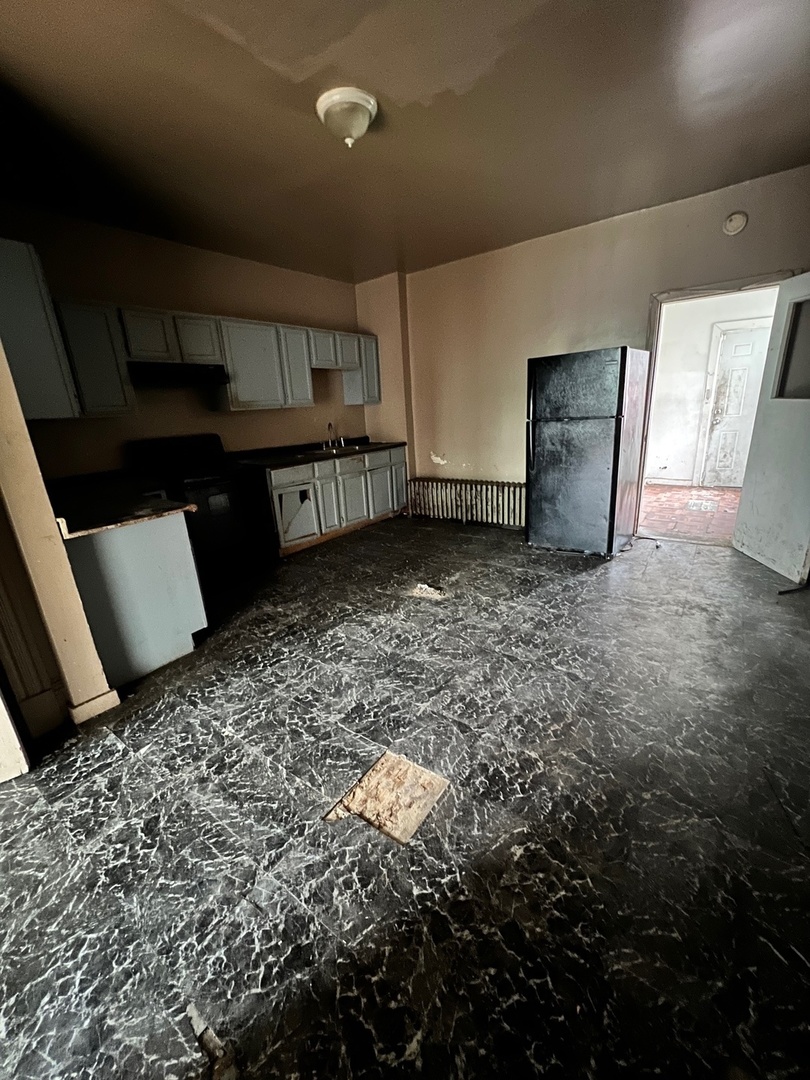 10614 South Langley Avenue, Unit 10614 Chicago, IL 60628 - Photo 10 of 11 a view of a livingroom with furniture