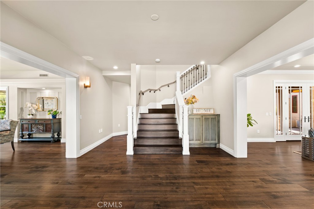 1688 Dwight Street Redlands, CA 92373 - Photo 4 of 72 a view of an entryway livingroom and hall with wooden floor