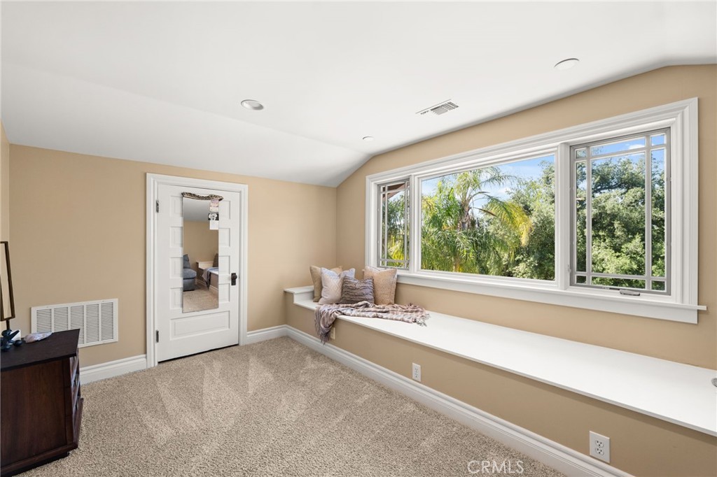 1688 Dwight Street Redlands, CA 92373 - Photo 42 of 72 a living room with furniture and large windows