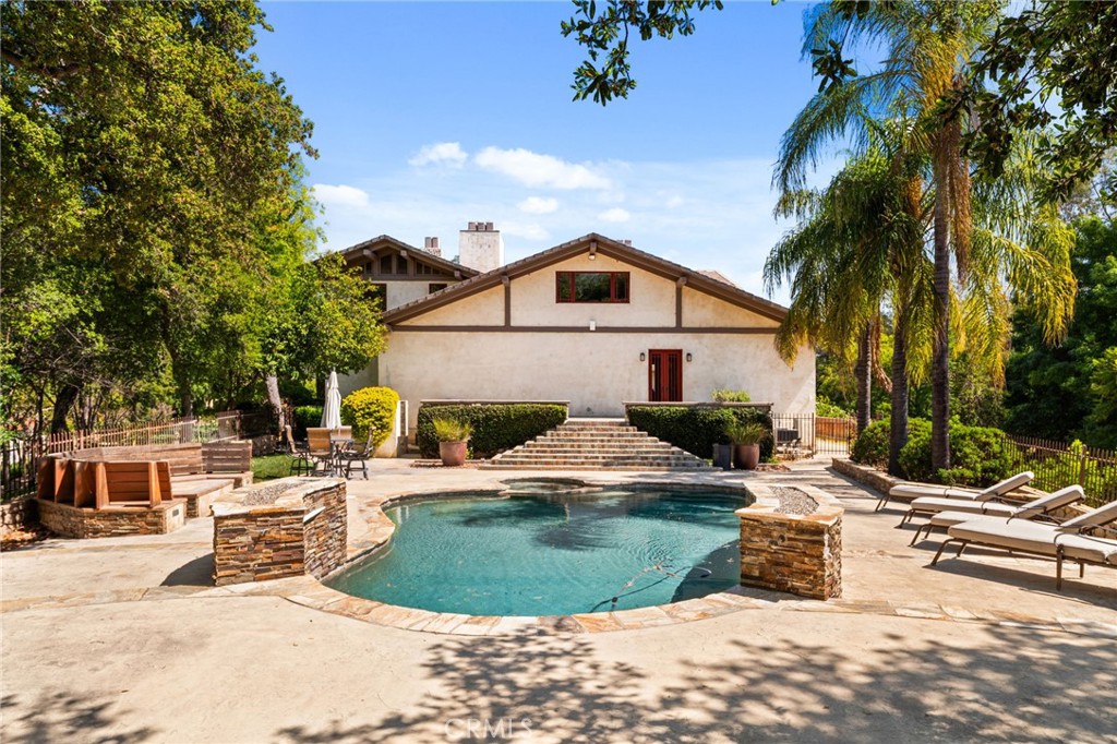 1688 Dwight Street Redlands, CA 92373 - Photo 61 of 72 a view of a house with swimming pool and sitting area