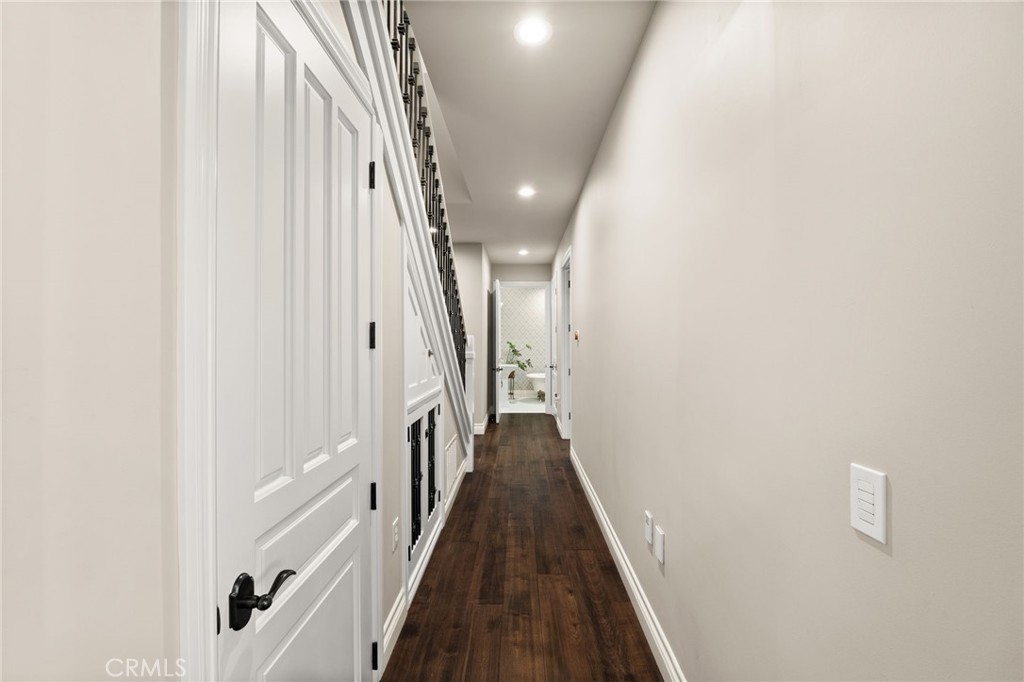 1688 Dwight Street Redlands, CA 92373 - Photo 9 of 72 a view of a hallway with wooden floor and entryway