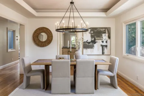 a view of a dining room with furniture window and chandelier