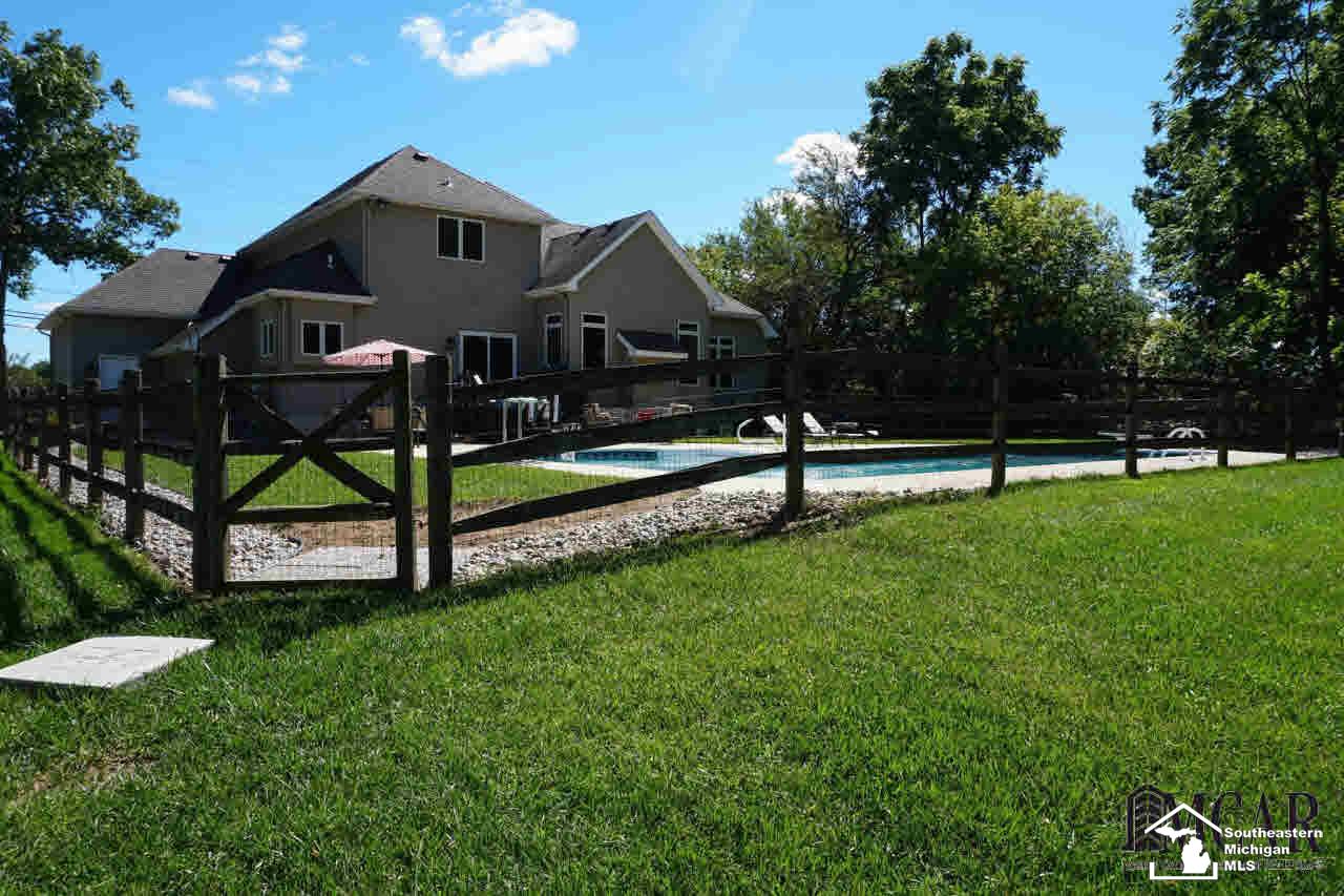 7919 Monroe Road Lambertville, MI 48144 - Photo 39 of 45 Fenced are around Pool