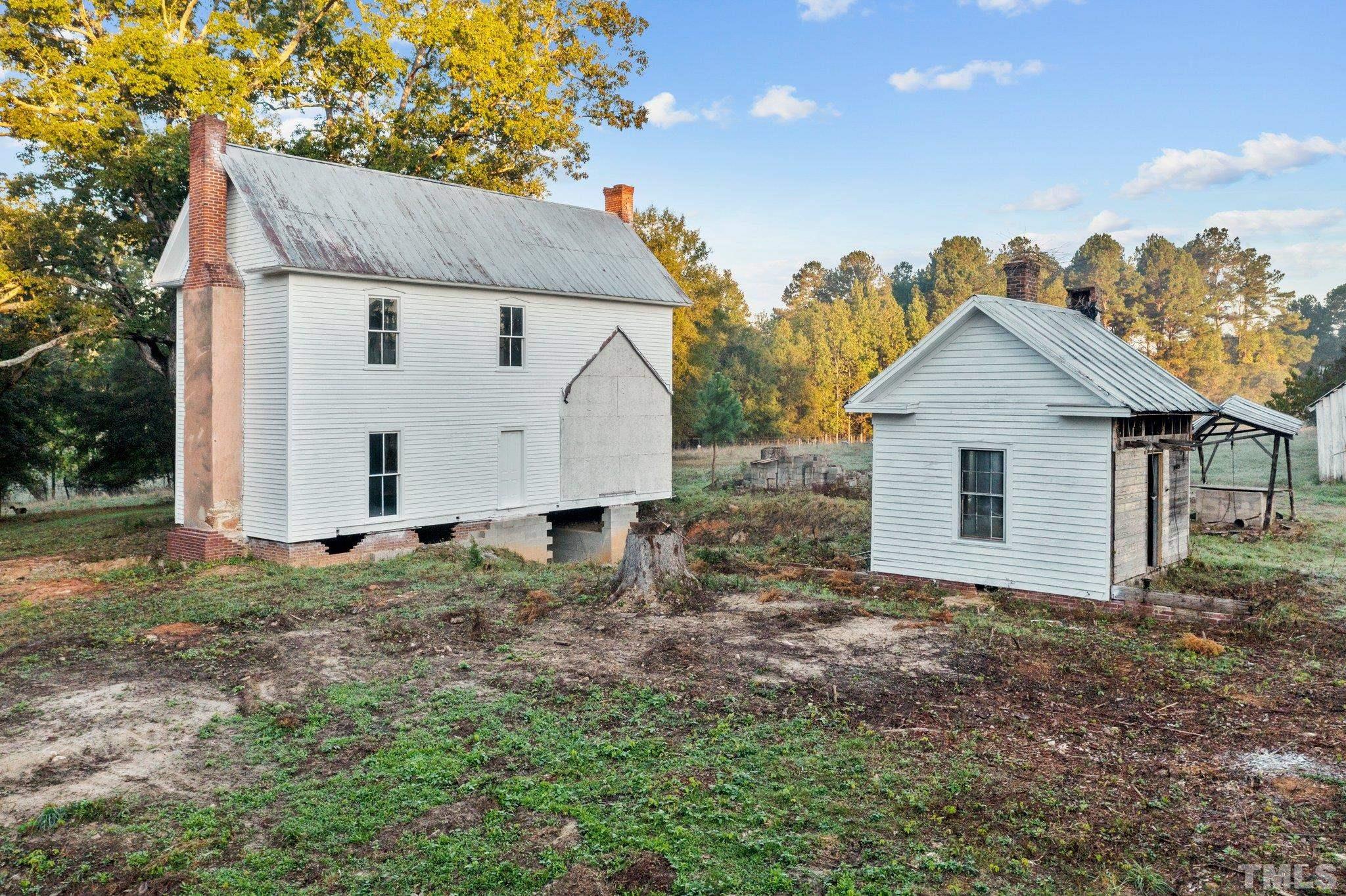 4720 Bahama Road Rougemont, NC 27572 - Photo 7 of 30 a view of a house with backyard and garden