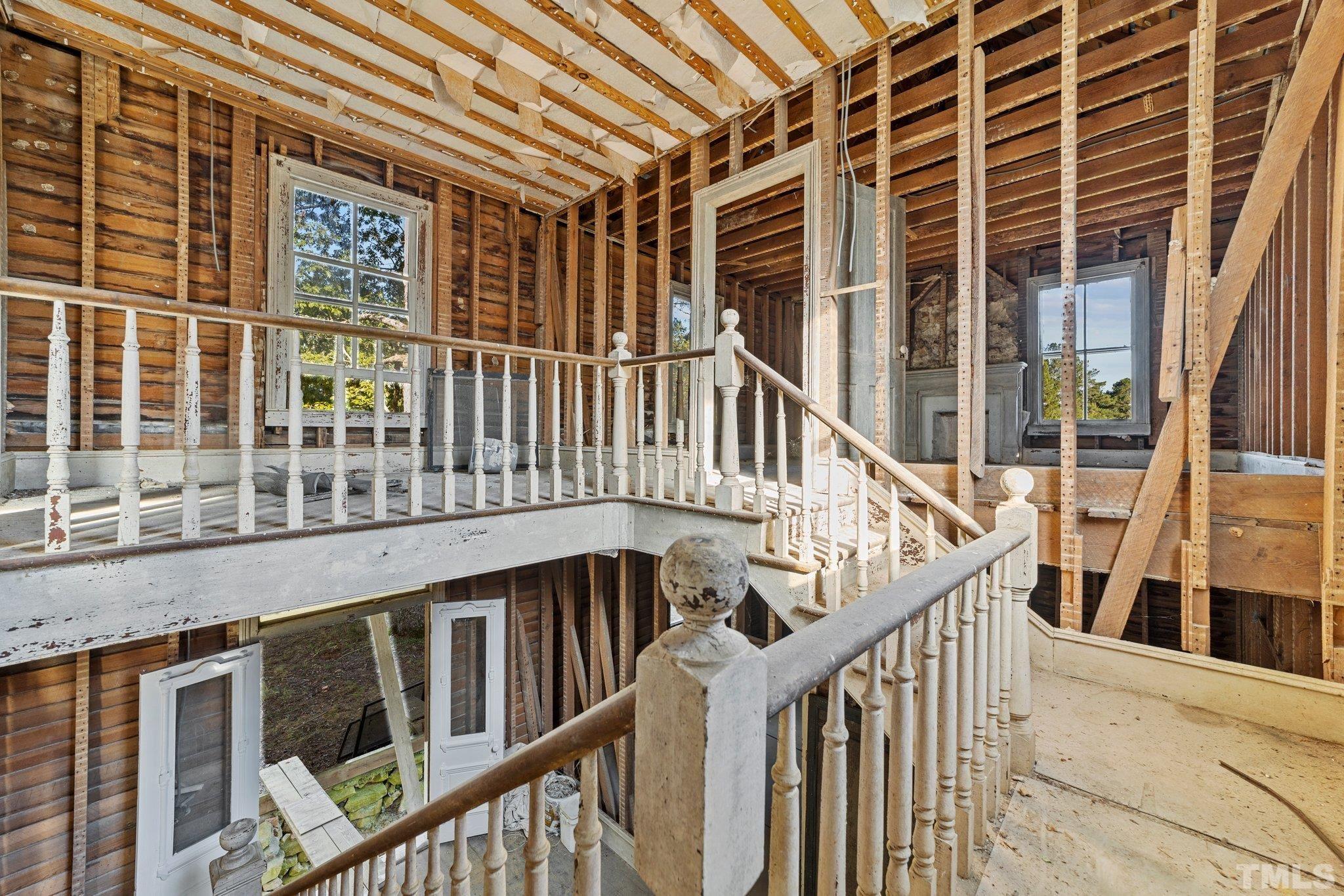 4720 Bahama Road Rougemont, NC 27572 - Photo 10 of 30 a view of balcony with wooden floor and stairs