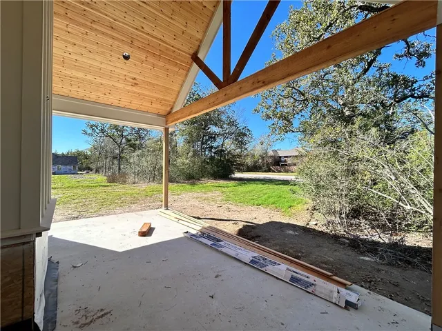a view of swimming pool with a yard