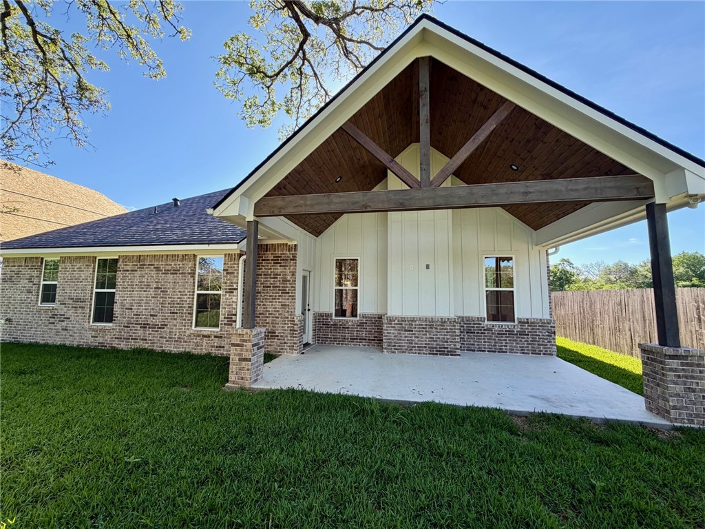 4015 Pacific Crest Way Bryan, TX 77802 - Photo 19 of 22 a view of a house with backyard and porch