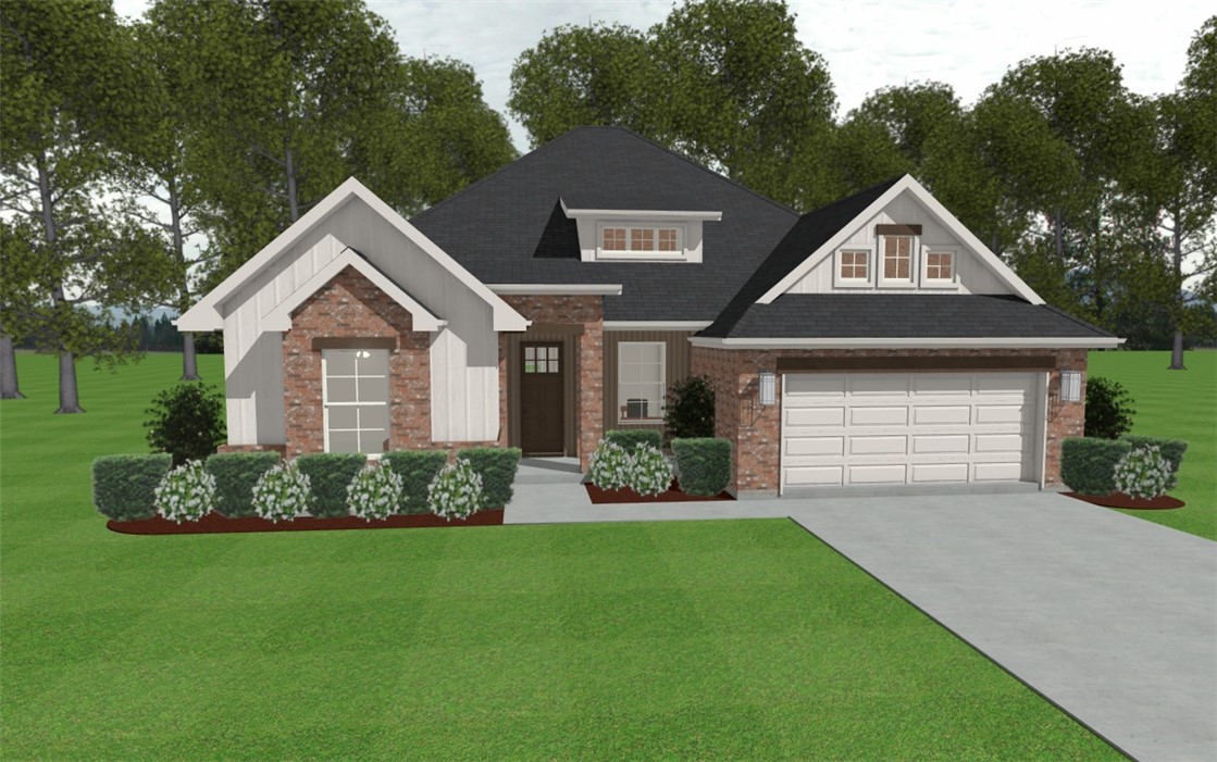 4015 Pacific Crest Way Bryan, TX 77802 - Photo 21 of 22 a front view of a house with a yard and garage