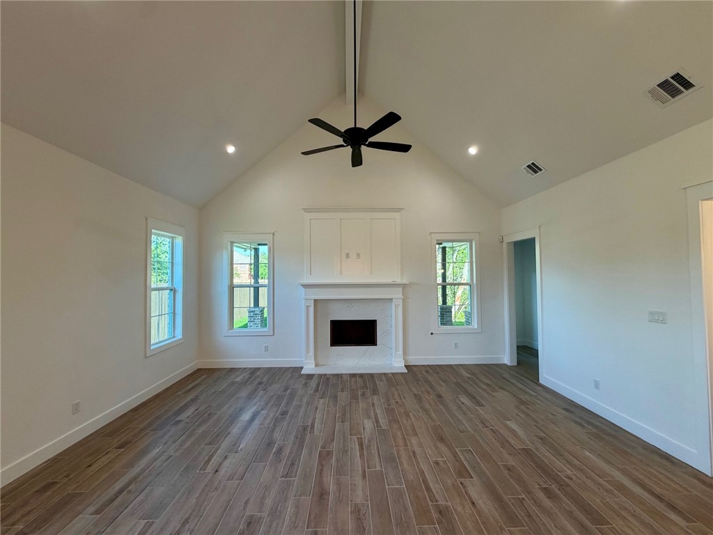 4015 Pacific Crest Way Bryan, TX 77802 - Photo 3 of 22 a view of an empty room with a fireplace and a window