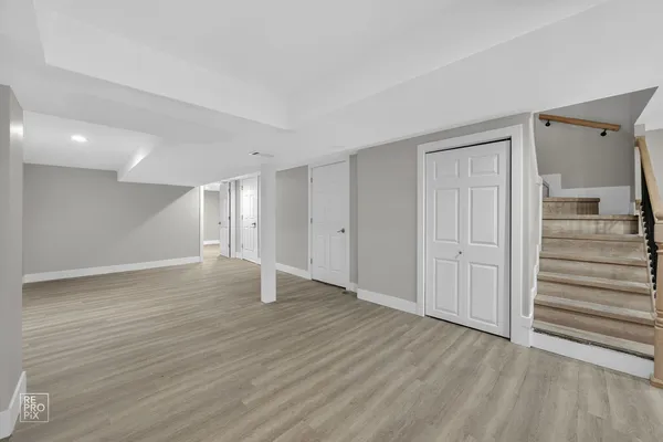 a view of a livingroom with wooden floor